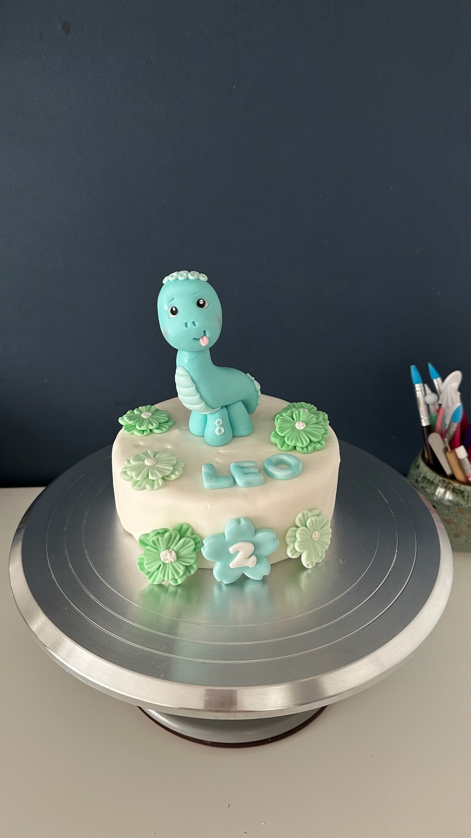 Cute Dinosaur Fondant Cake Topper – Handmade & Personalized Birthday Cake Decoration.